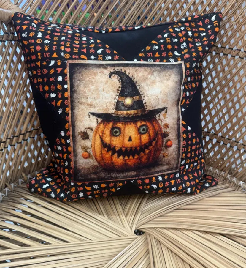 "Handmade quilted throw pillow with decorative fabric and professional finishing"