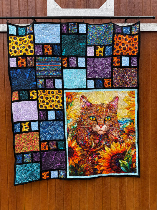 Stained glass cat at night