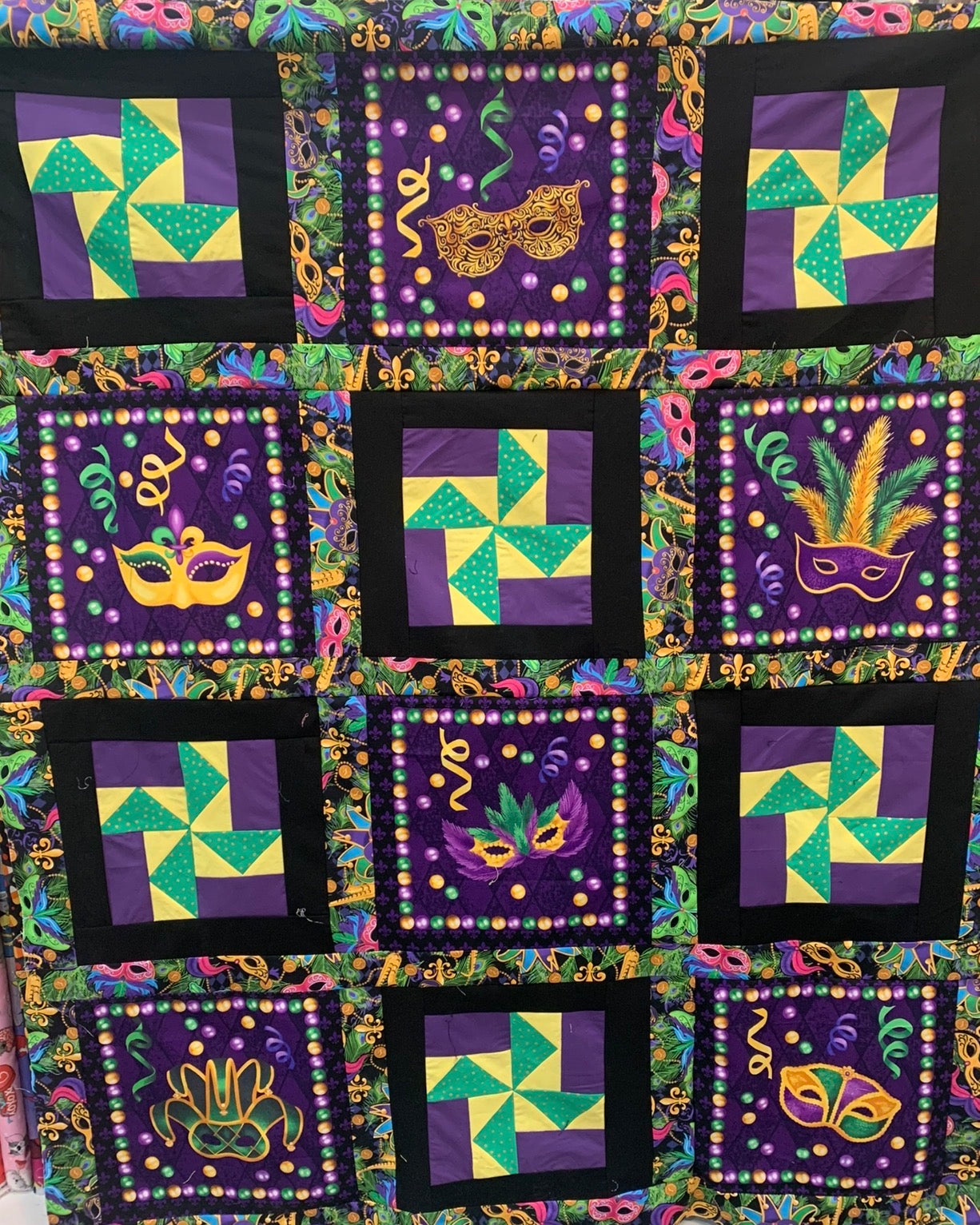Mardi Gras lap quilt