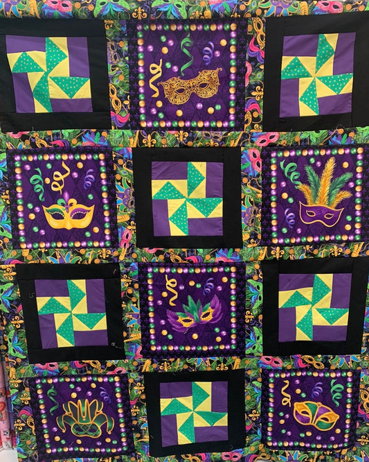 Mardi Gras lap quilt