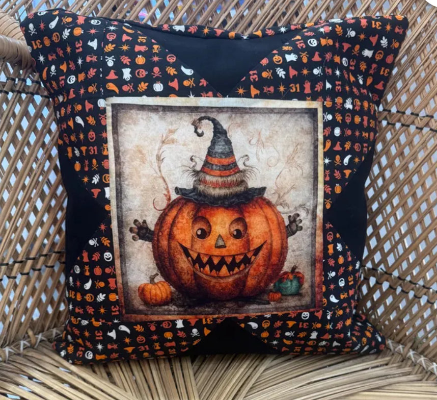 "Handmade quilted throw pillow with decorative fabric and professional finishing"
