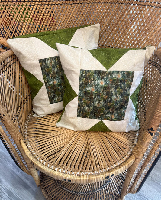 "Handmade quilted throw pillow with decorative fabric and professional finishing"
