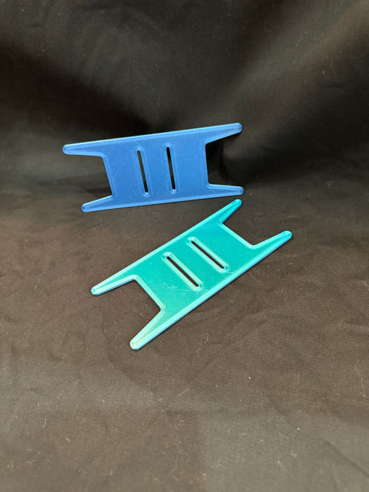 "Quilting binding holder tool for organizing and storing quilt binding strips"
